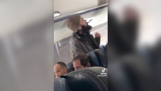 Dorky Man Terrorizes Plane Mid-Flight with a Spoon.. Gets Manhandled by Passengers