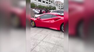 Forklift Driver Accidentally Dropped an Oven Onto The Hood of a Parked Ferrari