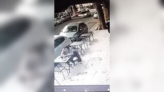 Man is knocked out cold as he’s smashed in the head by falling glass pane