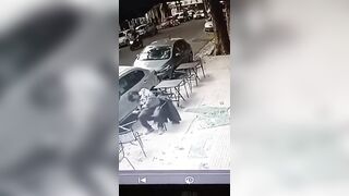 Man is knocked out cold as he’s smashed in the head by falling glass pane