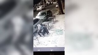 Man is knocked out cold as he’s smashed in the head by falling glass pane