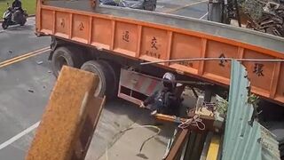 Biker Smashes into Semi, Gets Head Stuck, Somehow Survives