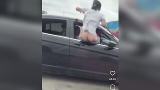Complete Moron Falls out of Speeding Car Trying to Show off on Highway