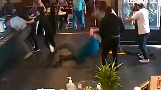 Enough Food for Everyone... People Brawl at a Buffet