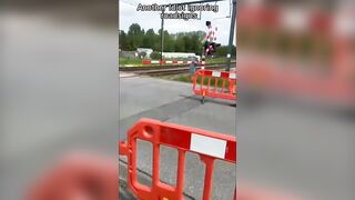 Female Driver Goes Braindead at a Train Crossing