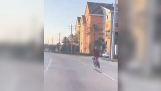 Had It Coming: Cyclist Holding Up Traffic Receives Some Instant Karma!