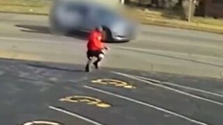 Thug on the Run Tries to Shoot Cop in His Cruiser, Gets Turned into Roadkill
