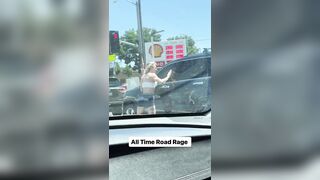 Hot Gym Chick Road Rages and Attacks her Mans Car.
