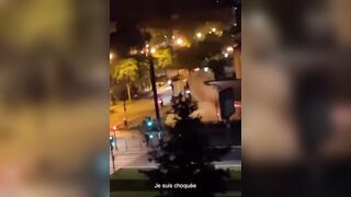France on Fire! Rioter Throws a Full Blown Hand Grenade at Police