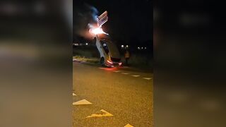 Drunk Driver's Car Catches on Fire After Driving it up a Street Sign!