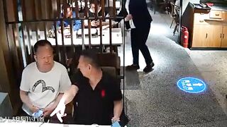 Not a Kung-Fu Movie Just a Guy Attacking another Guy with Chopsticks.