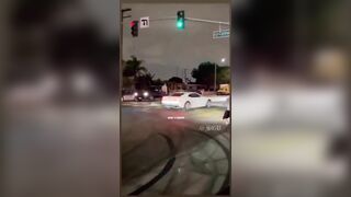 Man Escapes From Cops by Jumping on The Back of a Pickup Truck .
