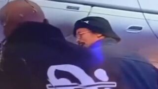 Man on a British Airways Flight Stabs Another with a Broken Bottle