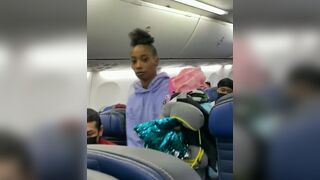 Wait for It: Girl Assaults Man recording as she is Kicked Off Plane