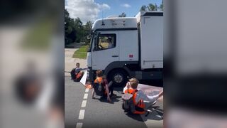 Truck Driver is Sick of the Protestors. So he Runs them Over