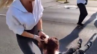 The Woman Protestor is Just Dragged by her Hair...Twice