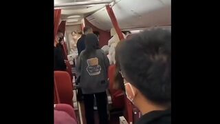 Yet Another Person on a Plane Freaks out Claiming the Stewardess is a Robot.