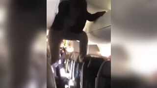 Woman LOSES her Mind on Airplane...Turns into Spiderman
