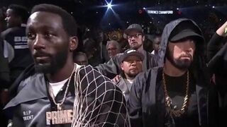Eminem makes Rare Appearance, Walks Crawford Out to Ring Saturday Night