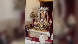 Dad REALLY thinks his Son is the Chosen One (Watch what he does in the Middle of Mass)