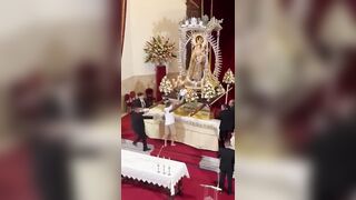 Dad REALLY thinks his Son is the Chosen One (Watch what he does in the Middle of Mass)
