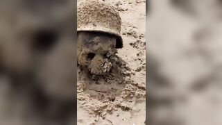 Dried up River reveals the Skulls and Heads of Ukraine Soldiers
