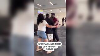 Big Guy Swings hard on Girl at Airport (Spirit Airlines)