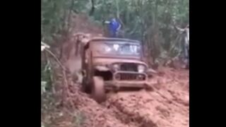 Horrifically Bad Day as Tow Line Snaps While Trying to Pull Jeep out of Mud