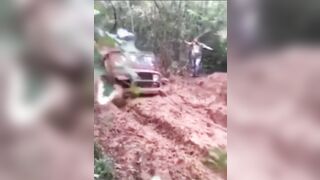 Horrifically Bad Day as Tow Line Snaps While Trying to Pull Jeep out of Mud