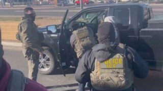 ICE agents smash the window of an illegal alien’s truck after he refuses to comply