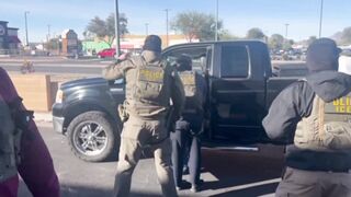 ICE agents smash the window of an illegal alien’s truck after he refuses to comply