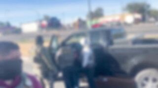 ICE agents smash the window of an illegal alien’s truck after he refuses to comply