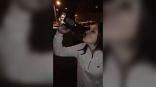 Drunk Girl takes an entire bottle of Whisky in one Go