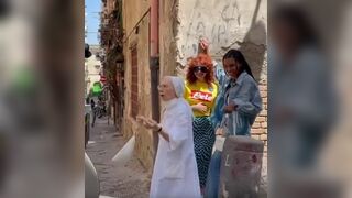 Nun pulls apart 2 Beautiful girls kissing during photo shoot in Italy
