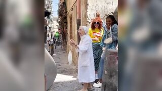 Nun pulls apart 2 Beautiful girls kissing during photo shoot in Italy