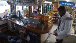Thug ties up gas station employees then dowses them with lighter fluid before setting them on fire