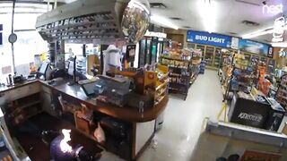 Thug ties up gas station employees then dowses them with lighter fluid before setting them on fire