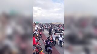 Bikers shut down the highway and stop traffic flow in one of the most important parts