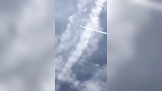 Observe closely as the chemtrail plane switches off the sprayers once it completes.