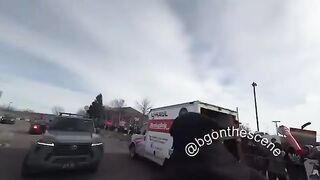 Jake Lang rides in a U-Haul outside the Bishop Henry Whipple Federal Building in MN