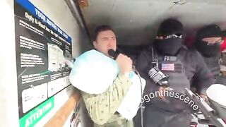 Jake Lang rides in a U-Haul outside the Bishop Henry Whipple Federal Building in MN