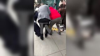 Cardi B giving a lap dance to a robot until it falls on top of her