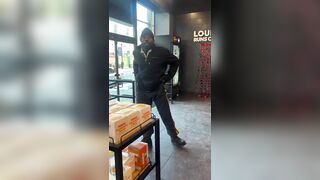 Employee at Dunkin' Donuts jumps the counter with a BAT and fights a customer