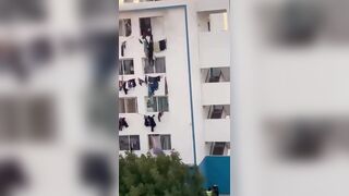 Students panic and try to escape burning building in Senegal.