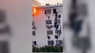 Students panic and try to escape burning building in Senegal.