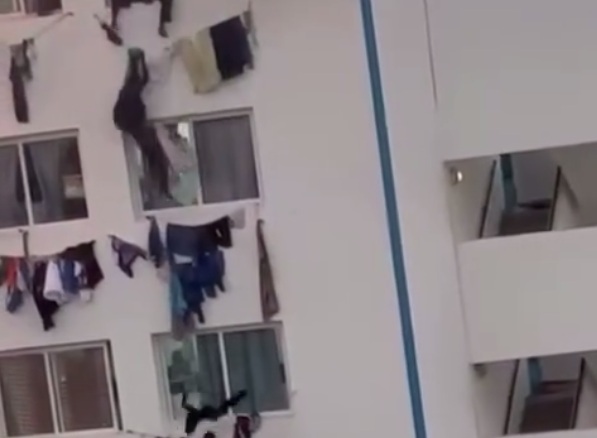 Students panic and try to escape burning building in Senegal.