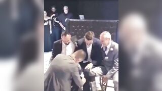 Friends make sure his wheelchair doesn't stop him from having a good wedding