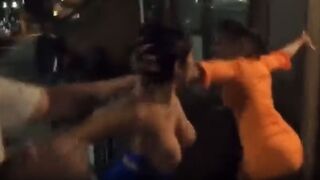 Black Girl in Blue loses her Top as She Beats her Opponent to Oblivion