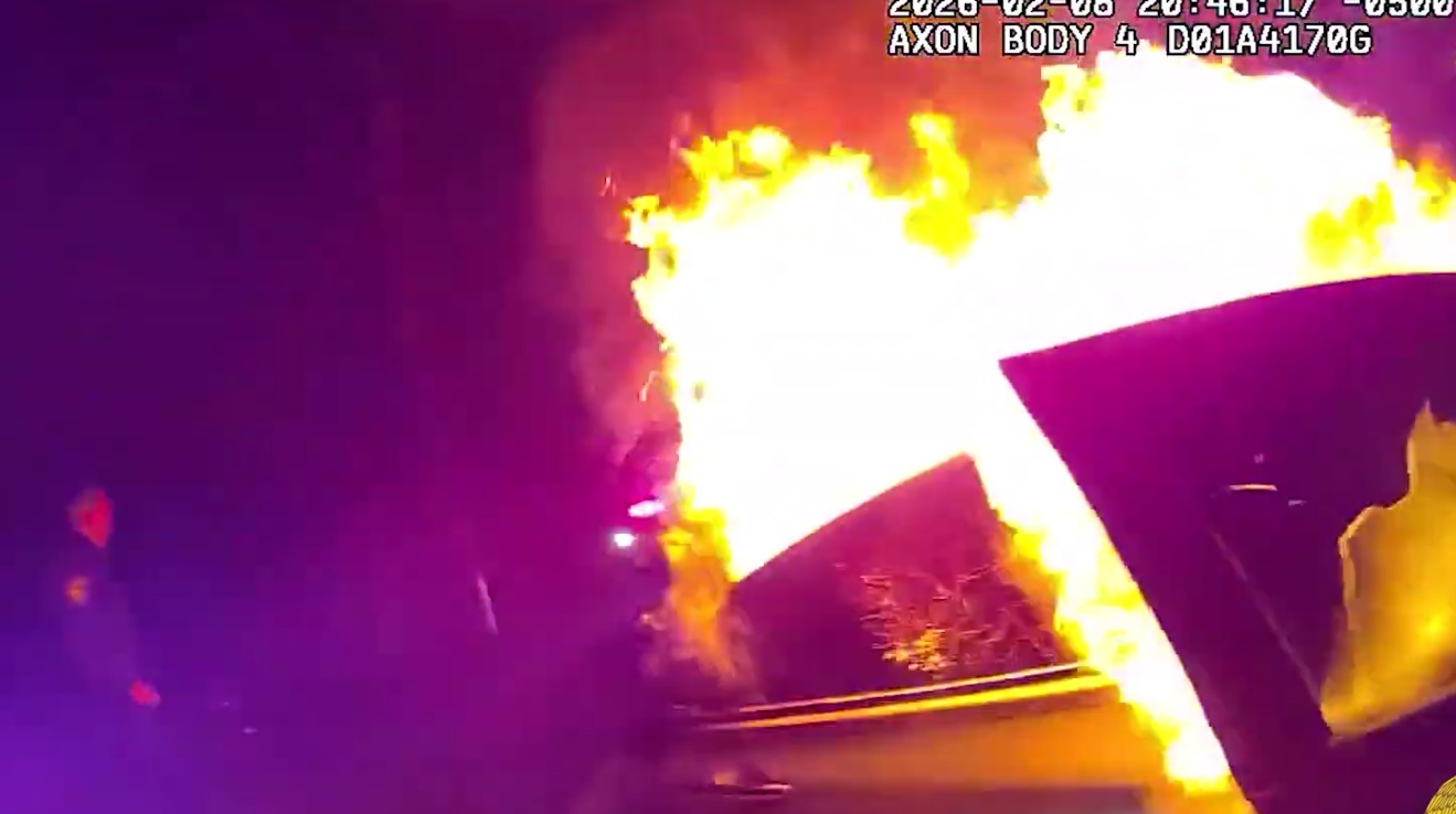 Officer Pulls Woman from Burning Car after Violent Carjacking