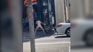 Cyclist gets Beaten by a Naked Guy after throwing his Bike at Him